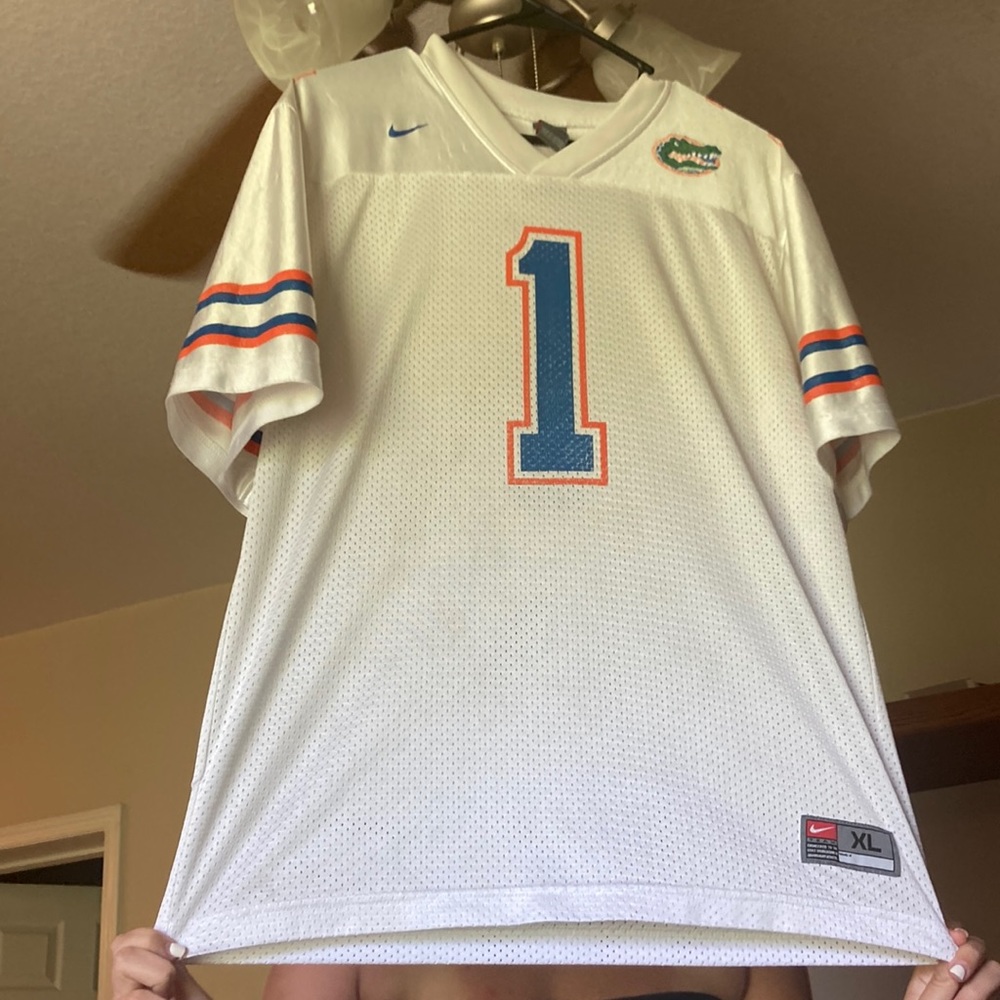 I used to wear the shirt in the water, silky material, beautiful gators jersey